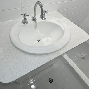 Resurfaced vanity top in our stone-look finish