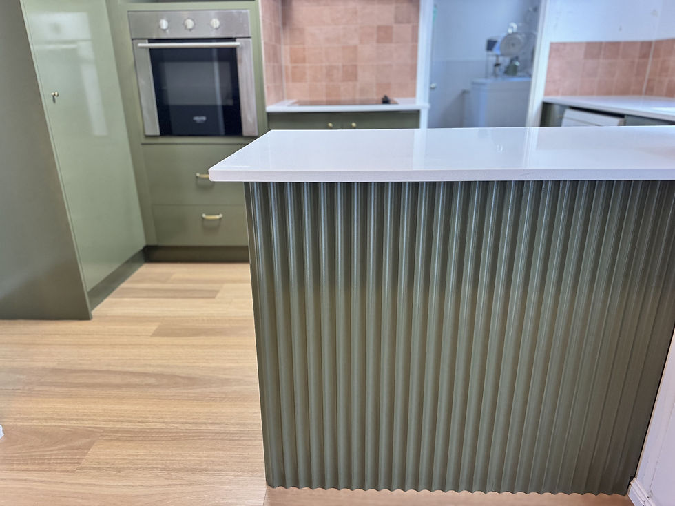 After photo showcasing the feature textured cabinet front in olive green.