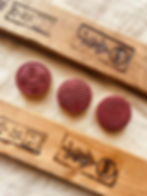 Oriental Coin Fondant Stamp shown on red fondant