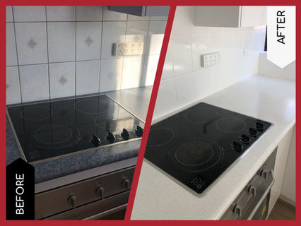 from dated navy and accent pattern tiles to fresh white tiles and a stone-look benchtop resurfacing.