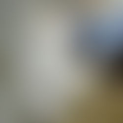 White bathroom tiles and bathtub in a resurfaced Sydney bathroom