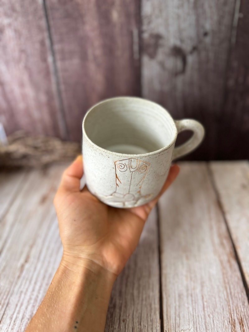 White-glazed mug with gold western cowboy boot design