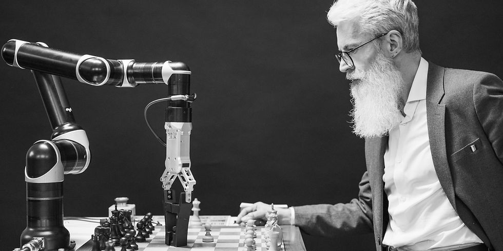 man playing chess with AI robot. Photo by Pavel Danilyuk