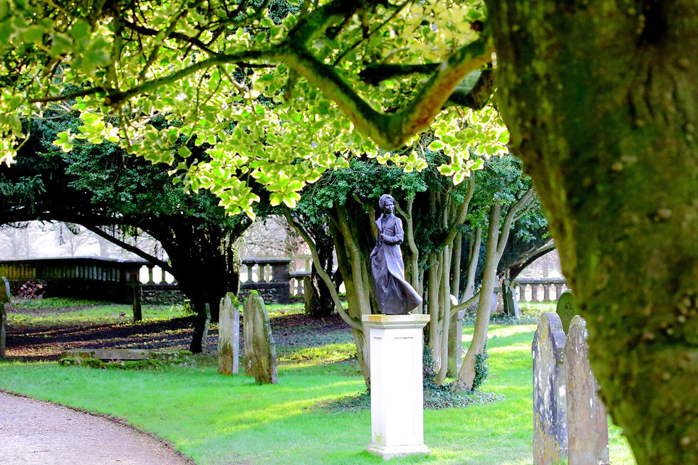 St Nicholas Churchyard with Jane Austens Bronze Statue 19th January 2022 Chawton