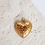 Thumbnail: Gouden bedel in de vorm van een hart