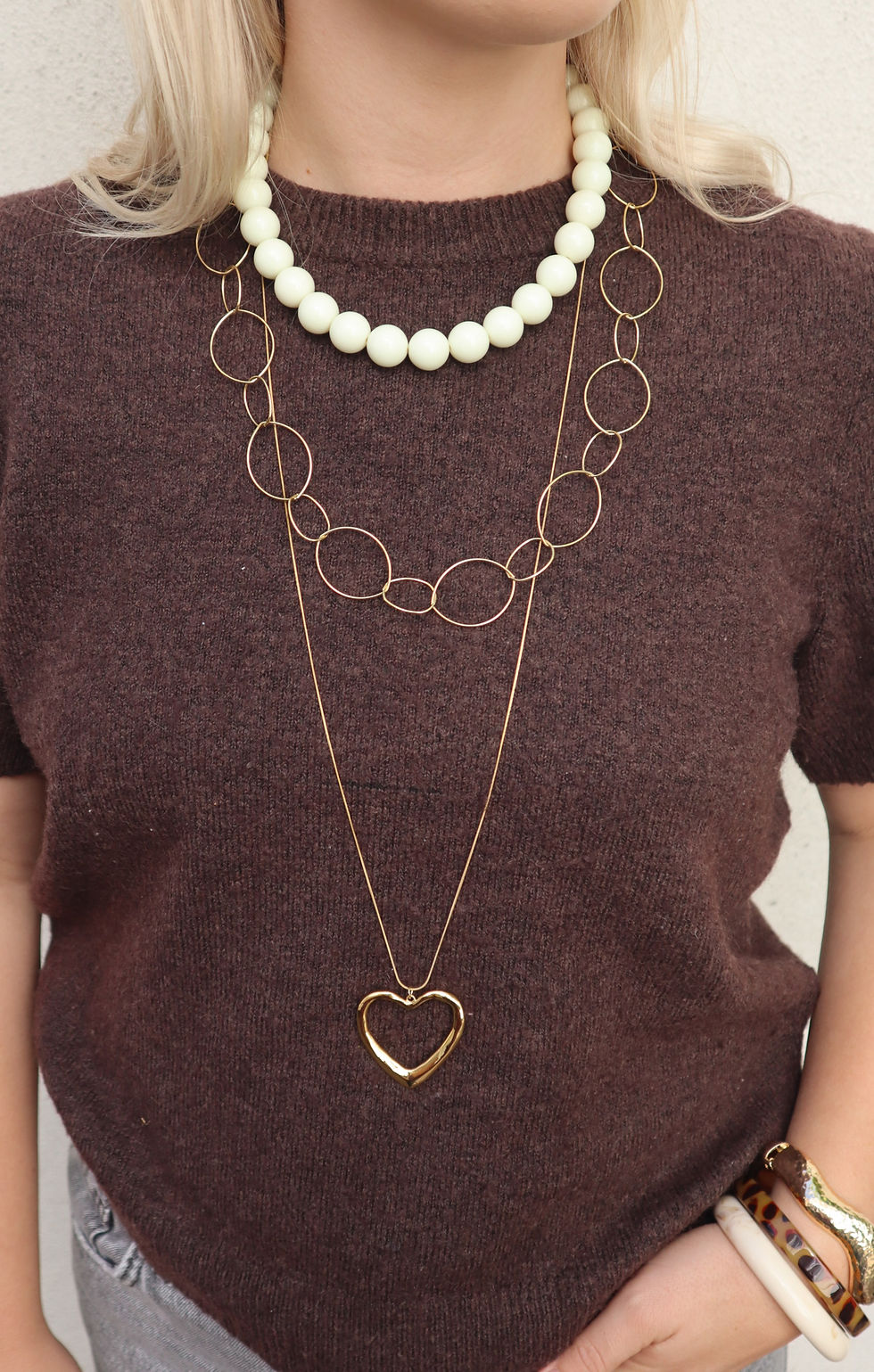 Lange gouden ketting met hart bedel
