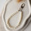 Thumbnail: gouden en zilveren bag charm hanger met parels