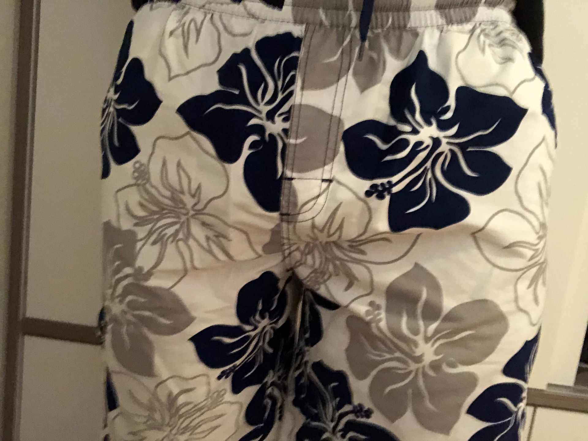 Packing with as-is packer, front view in swim trunks