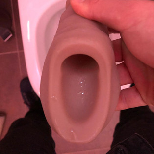 Sam STP closeup of the cup after pee use, small droplets of pee are left in the cup