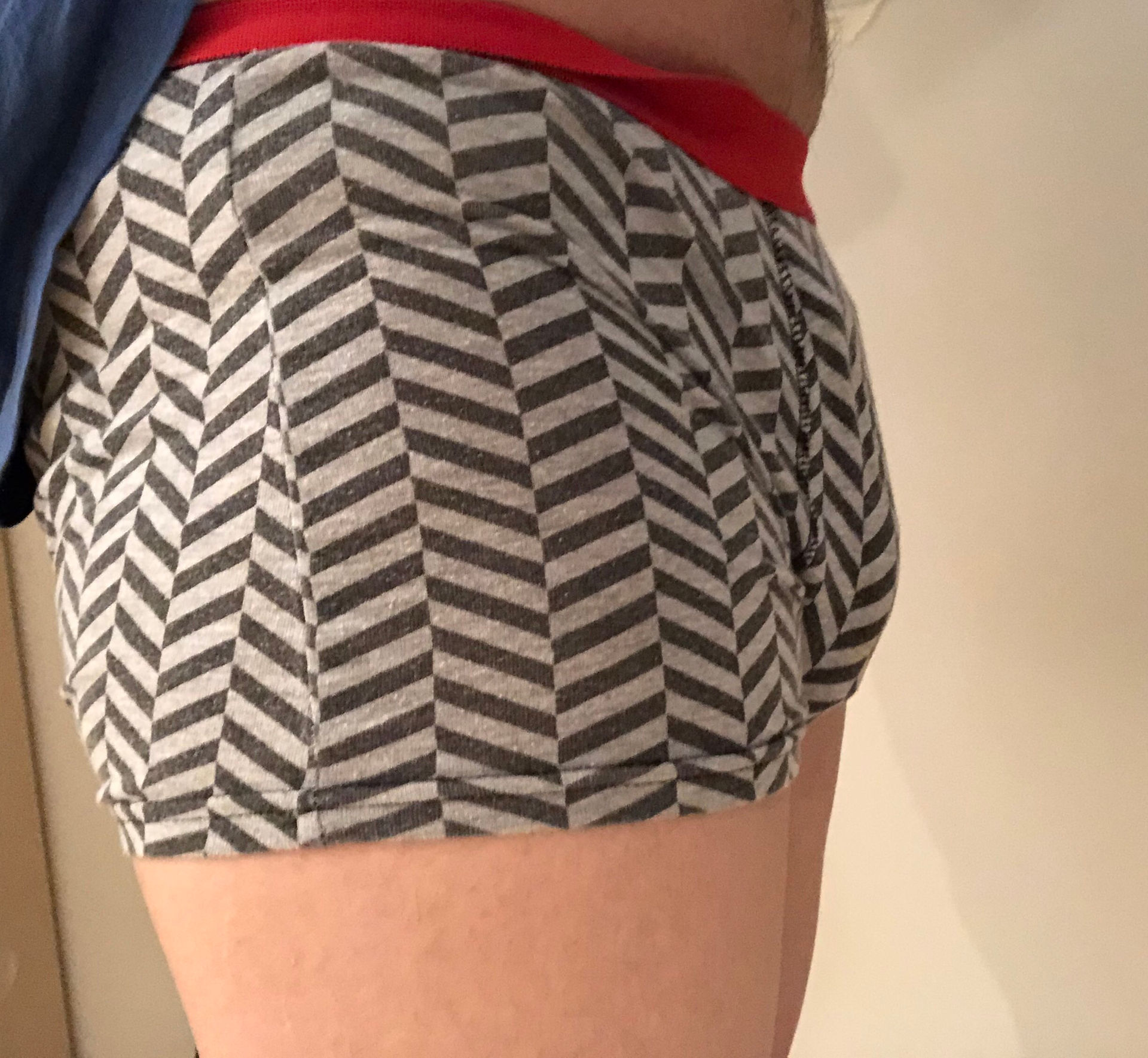 Packing with Tommy in boxers, side view