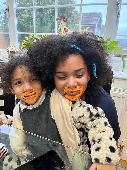Children wearing mouth tape