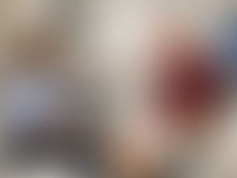 Occupational therapist conducting a home modification assessment with an older adult client in a bathroom.