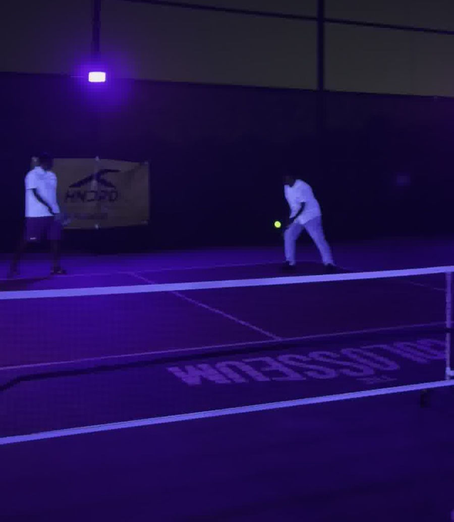 Glowing pickleball match with UV lighting at Dinkin Arena Chennai