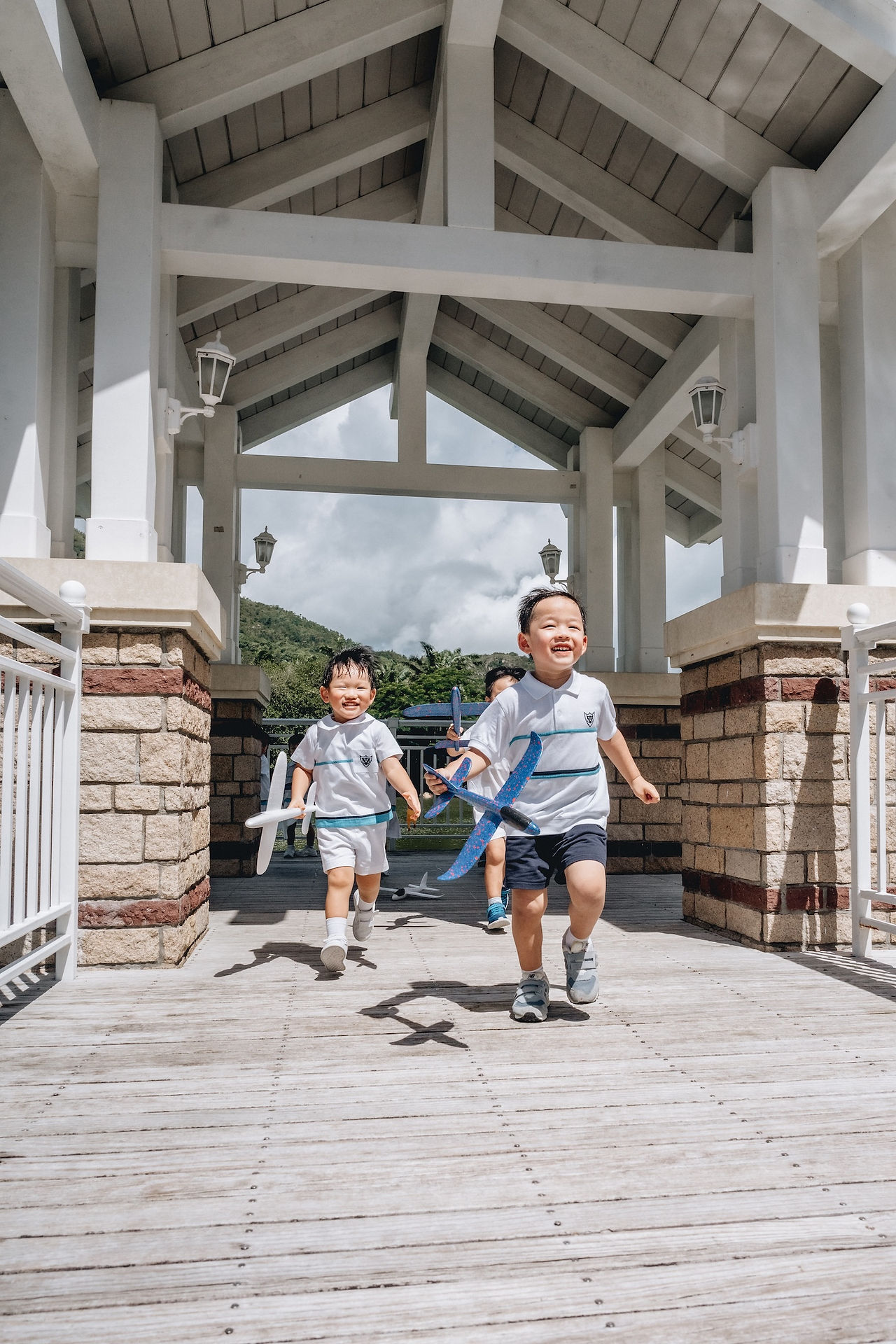 Graduation photoshoot at Disney Inspiration Lake in Hong Kong