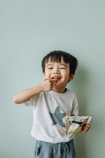 A picture of a boy posing for a picture.