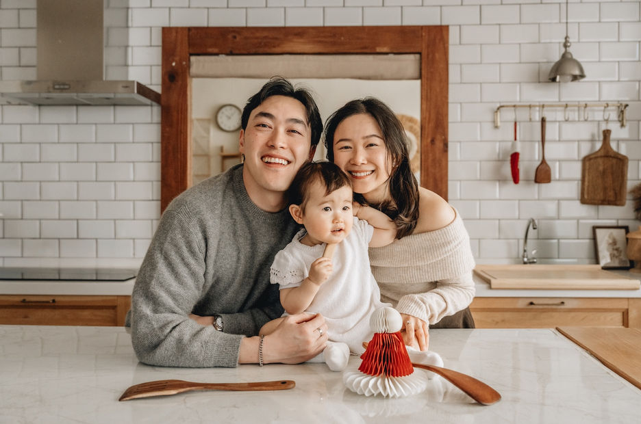 Hong Kong Family Photographer take pictures of family of three at in-home studio in Hong Kong.