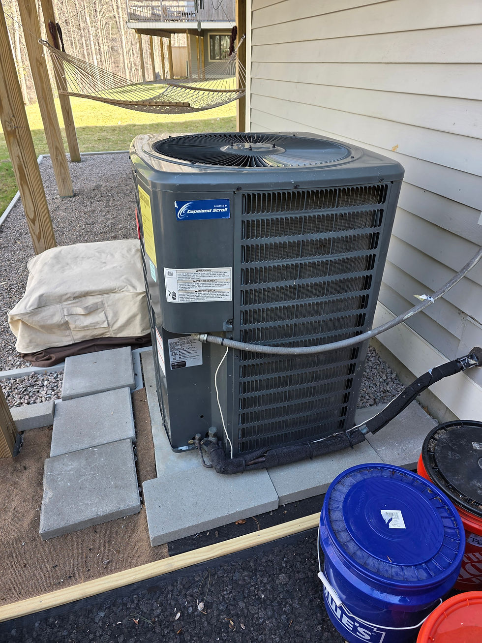 an exterior air conditioning unit at a home inspection in massachusetts