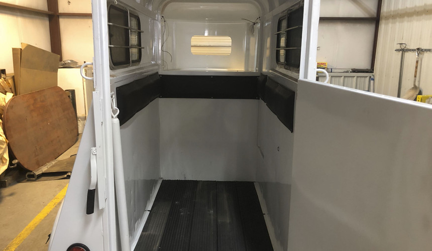 Inside of a 90's vintage one horse trailer restored by Dark Horse Metal Works