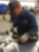 Professional metal fabricator measuring the correct bends after using a roll bending machi