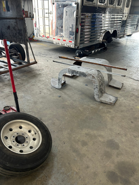 Parts of an old horse trailer that the Dark Horse Metal Works welders pulled off of the horse trailer to help refinish and restore back to a beautiful useful condition