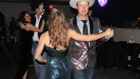 Couples dancing at the cowboys helping cowboys charity ball