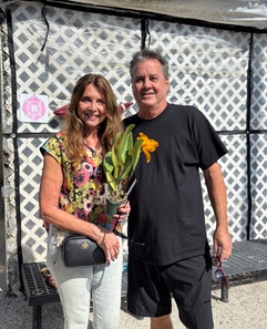 Two Tampa Orchid Club members after buying plants 