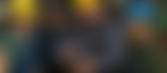 John Hannan explains the receiving and inventory systems to workers.