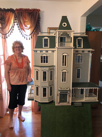 Mom with our Bayside Mansion.jpeg