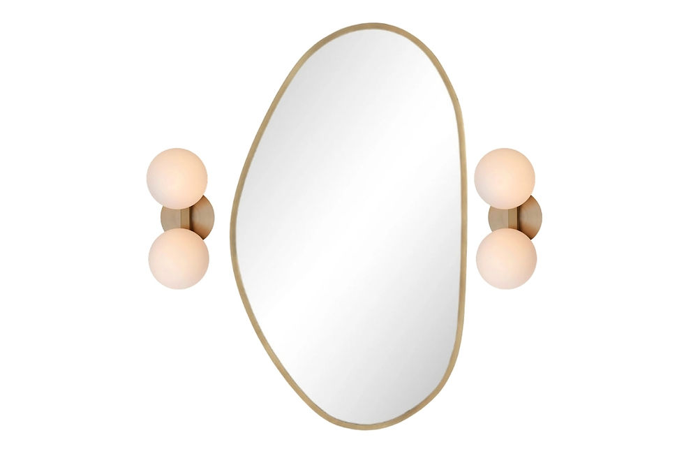 Oval gold-framed mirror with two frosted globe sconces on a white background, modern minimalist wall decor.