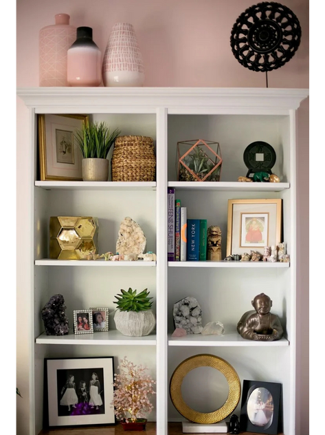 close up of home office built in shelving with objects on every shelf