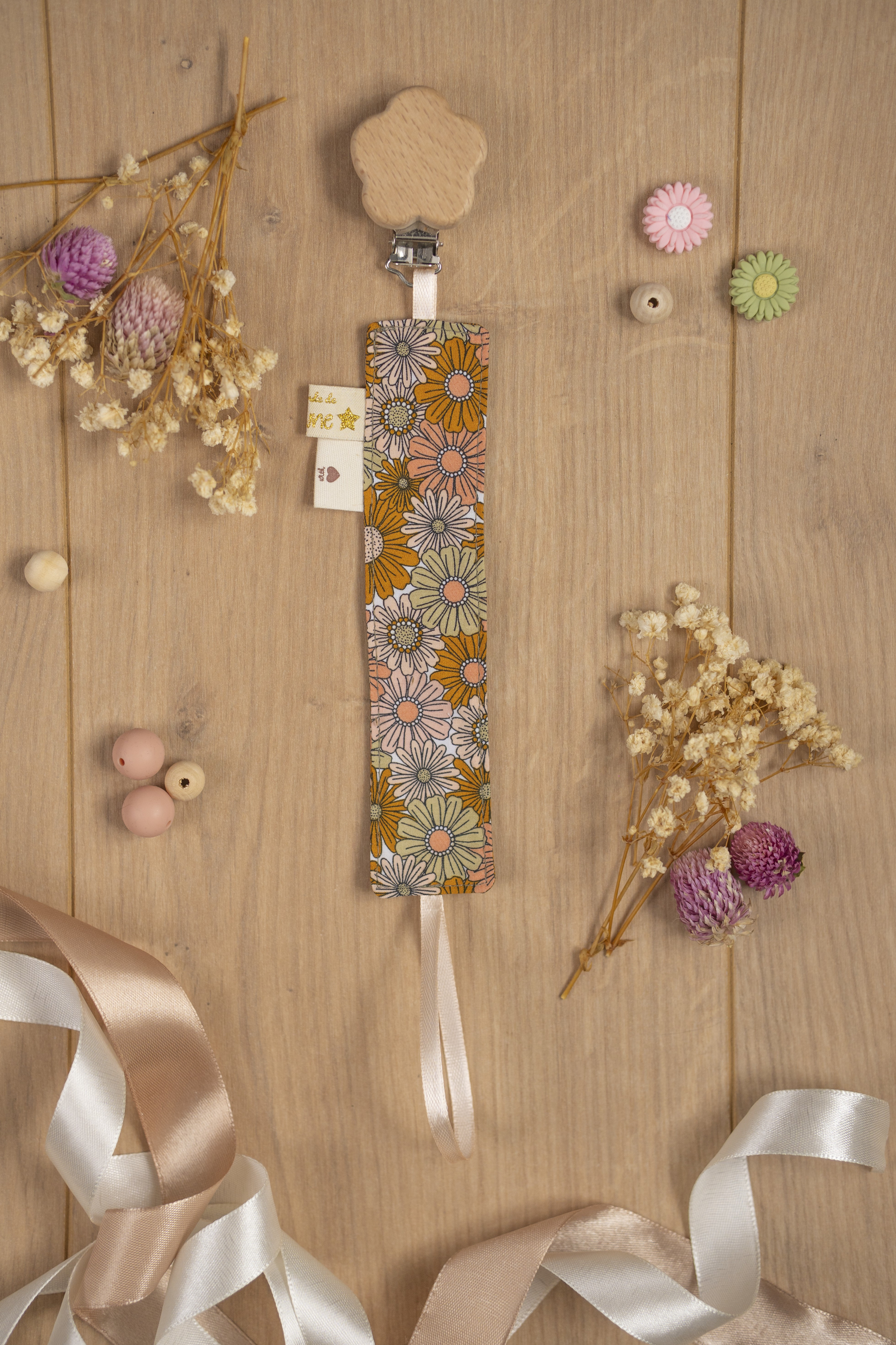 Attache pour tétine - flower power/orange