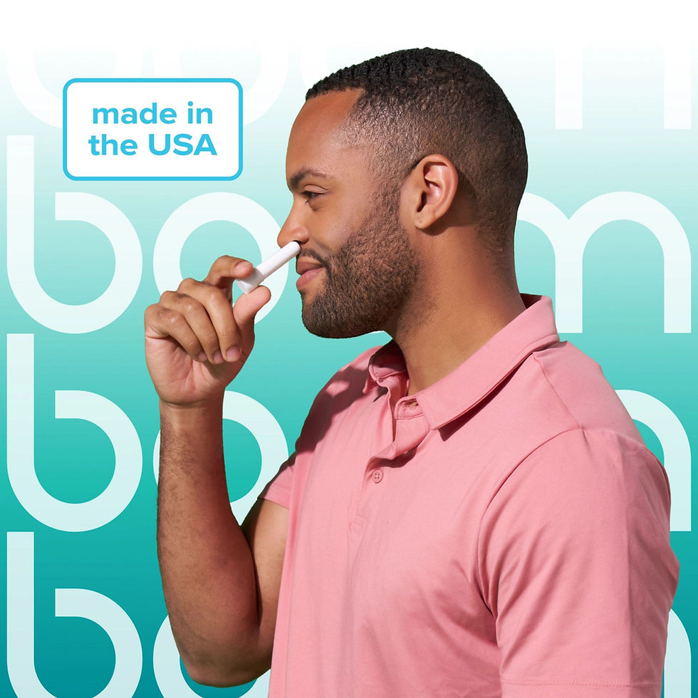 Man using BoomBoom wintermint nasal stick for refreshing airflow