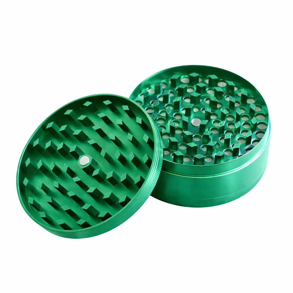 Thumbnail: Metallic green herb grinder side profile showing durable metal body