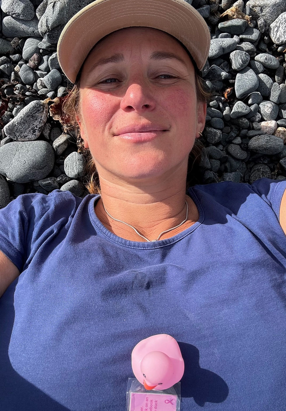 Getting a cold stone massage on Porthcallow beach with Duck (#CMSDucks on Facebook)