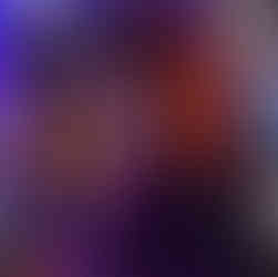 Close-up of a yellow underwater exploration vehicle showing mechanical arms, hoses, and technical equipment