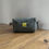 Thumbnail: SMALL WASHBAG | green vintage army canvas with yellow zip