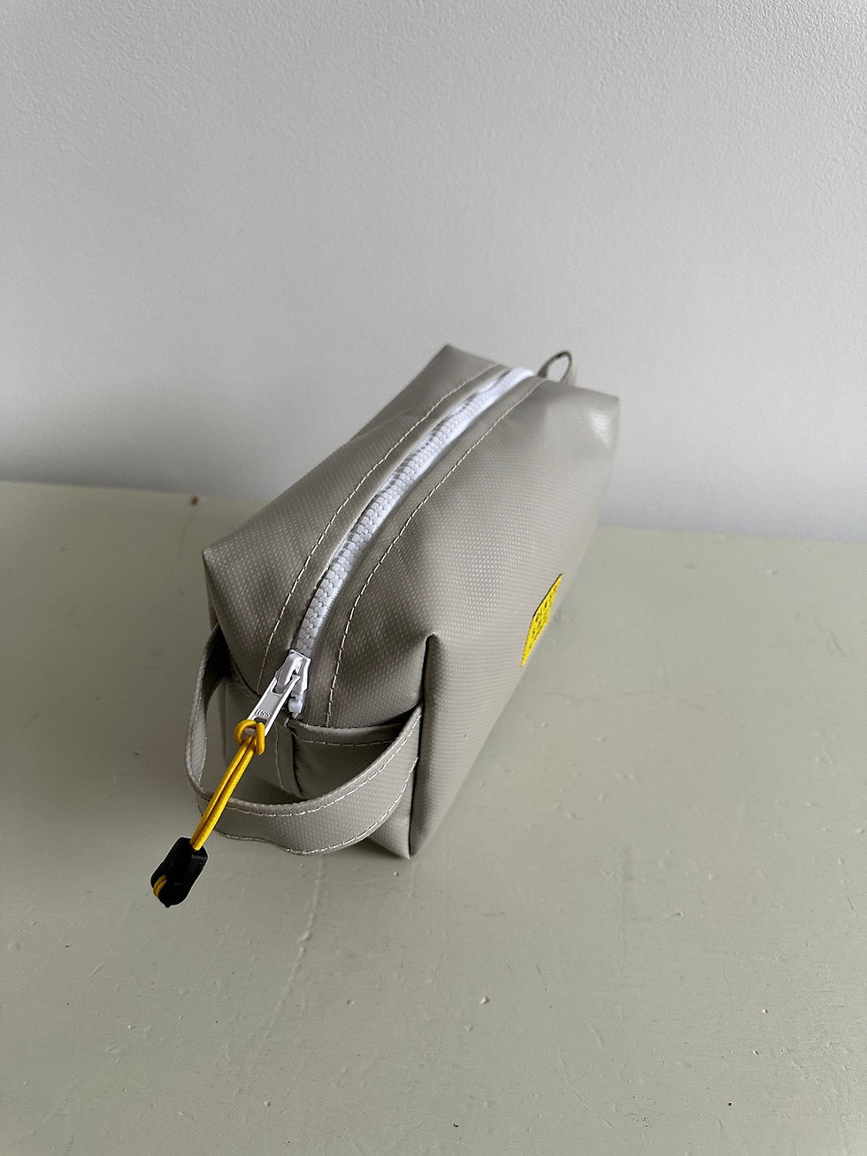 Thumbnail: SMALL WASHBAG | grey plastic with white zip