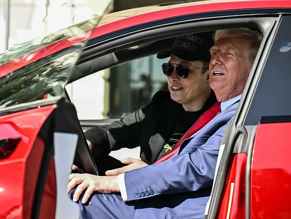US President Donald Trump and Elon Musk in a Tesla, during Trump's address on the company outside the White House | Credit: NBC