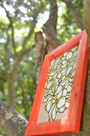 Red framed Hawaiian tropical wood artwork