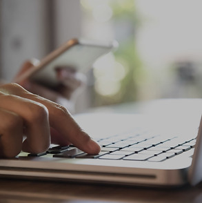 Sailing online courses showing laptop and phone