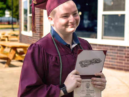 Thomas Archibald at his high school graduation