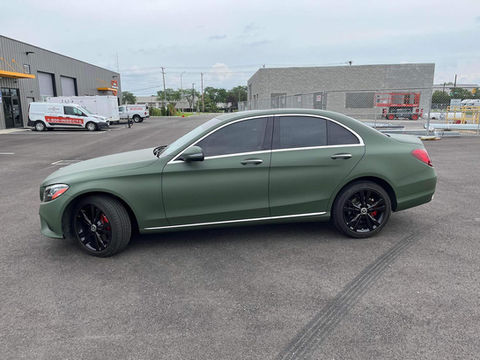 Car wrapped in military green vinyl