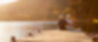 Kopie von Romantic Senior Couple Sitting On Wooden Jetty By Lake_edited.jpg