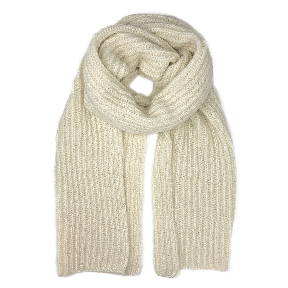 Cream-colored ribbed scarf against a white background, warm and stylish. Khaam Fefalene
