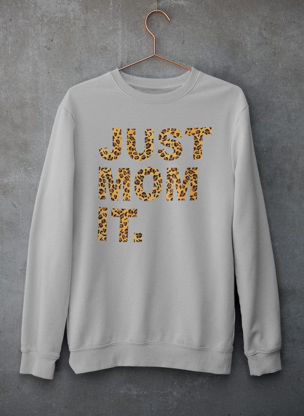 White sweatshirt displaying the text: JUST MOM IT. Simple design and concept.