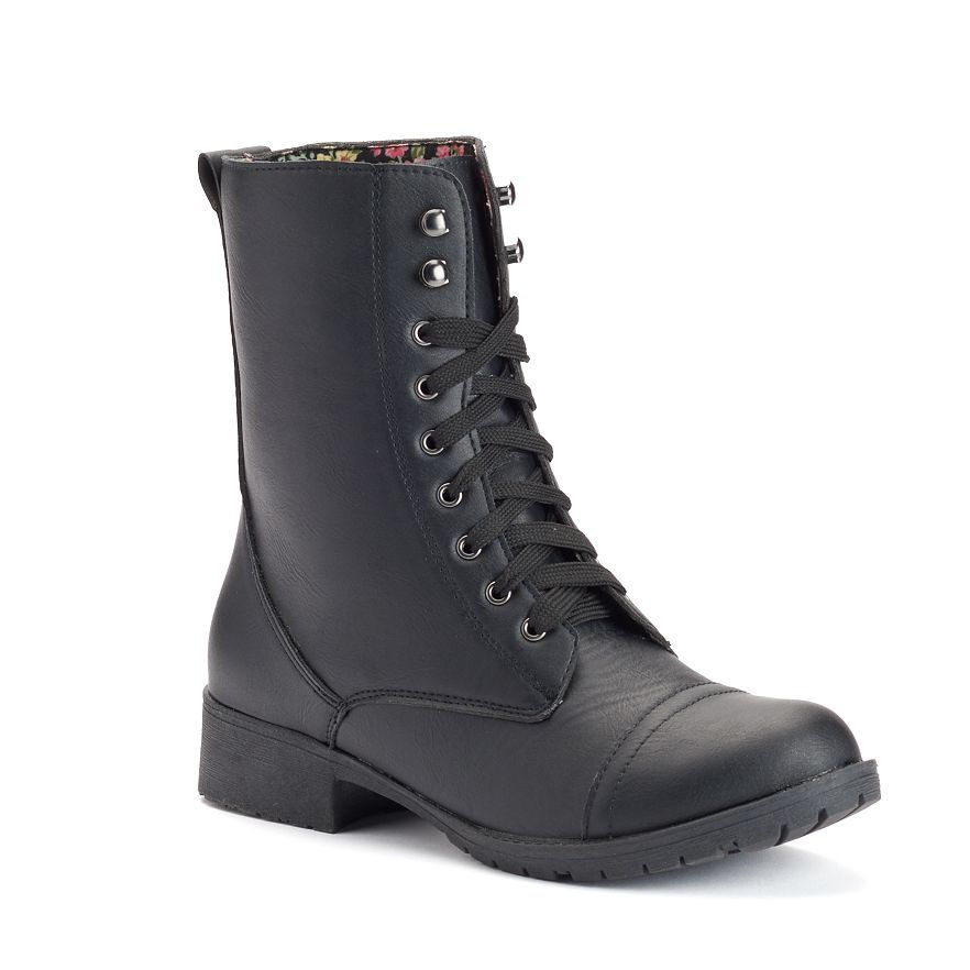 Black combat boot with laces and a low heel on a white background.