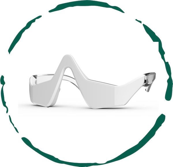 White mouth guard, inside a green circle. Protects teeth during sports.