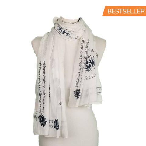 White scarf on mannequin with blue floral design and Bestseller text.