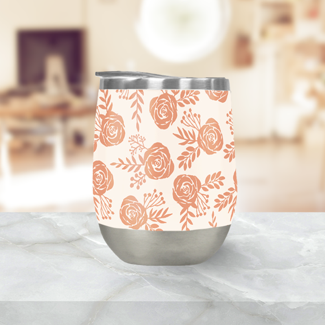 Floral pattern stainless steel wine tumbler on marble surface with soft background