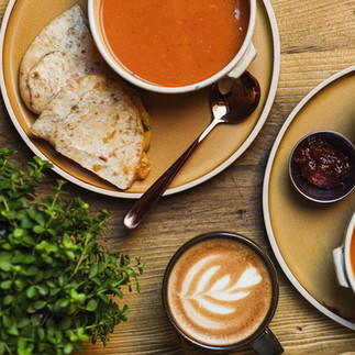 Red pepper soup and a pitta is served with a hot coffee at Out-there Artisan